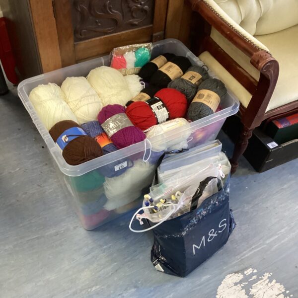 Large lot of colourful knitting wool and needles.