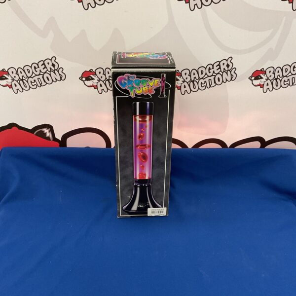 Vintage The Groove Tube lava lamp with flowing wax.