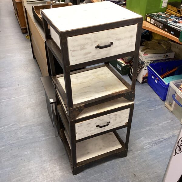 Vintage industrial bedside table with metal frame and wood shelves.
