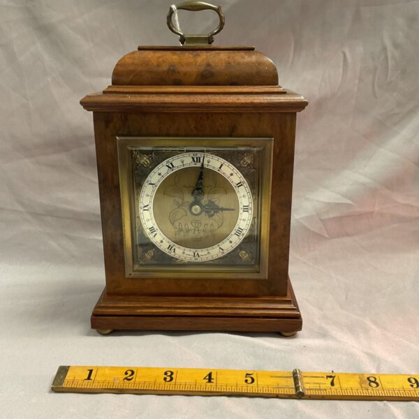 Front view of antique Elliott Burr Walnut bracket clock.