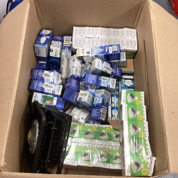 Mixed lot of LED and filament light bulbs in packaging.
