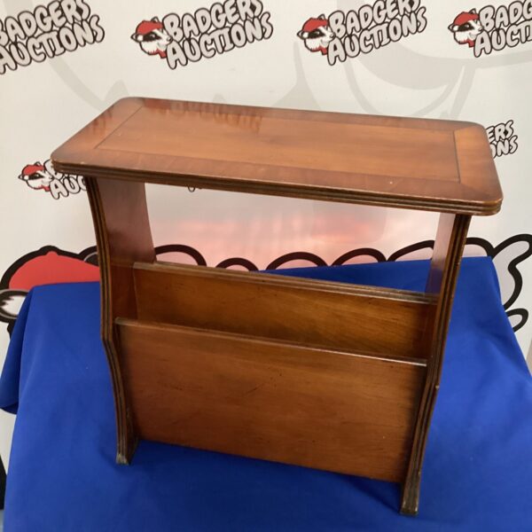 Vintage walnut magazine table with magazine storage.