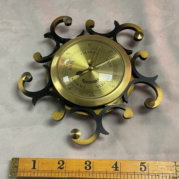 Vintage Lorister aneroid barometer showing rain, change, and fair weather.