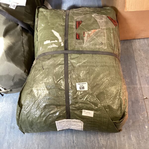 Large green tarpaulin rolled up, 6m x 9m size.
