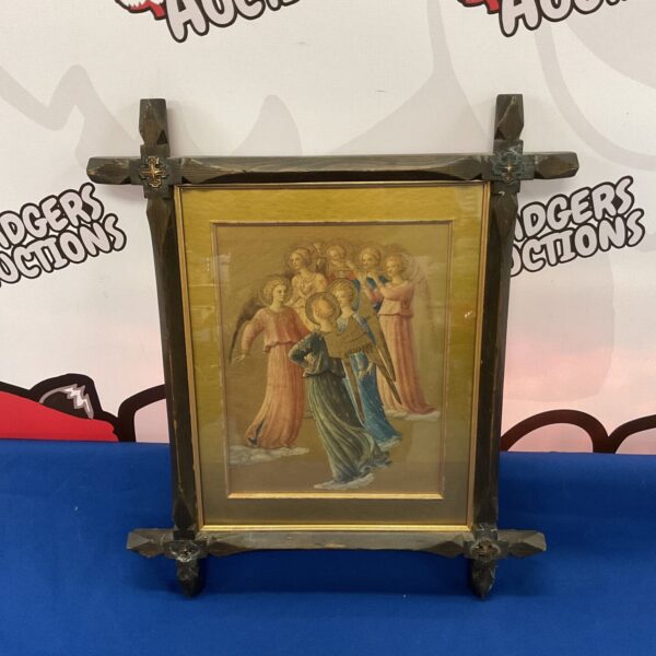 Vintage watercolour painting of angels in a gilt frame.