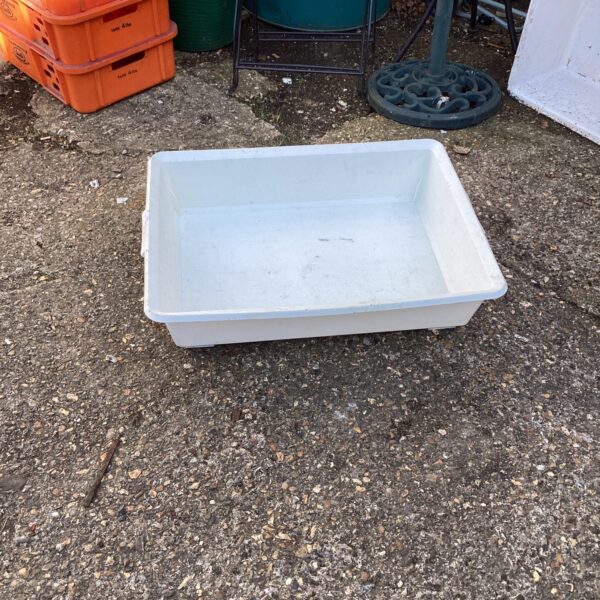 White Ikea storage tray for home organisation and utility.