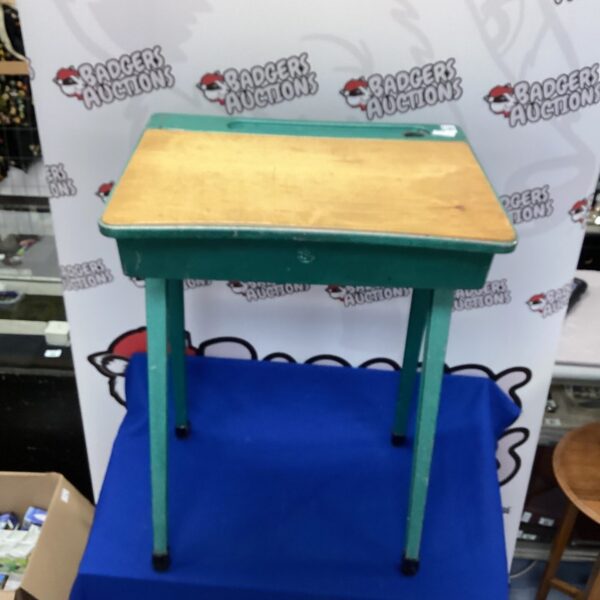 Vintage ESA school desk with green frame and wooden top.