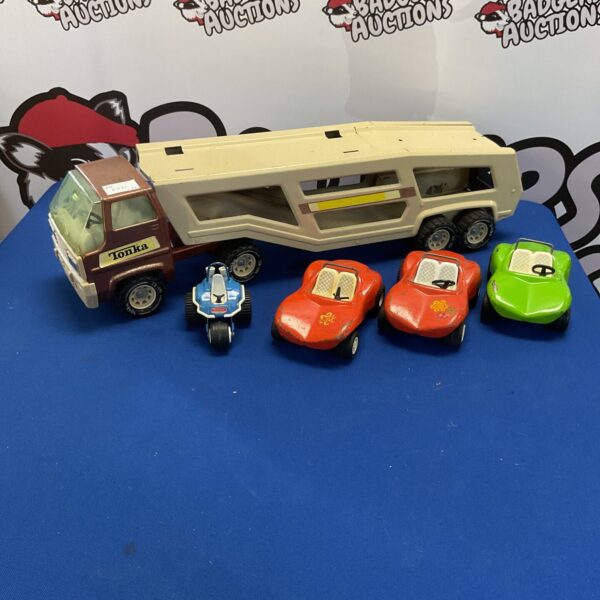 Vintage Tonka truck with Fun Buggies, collectible diecast toys.