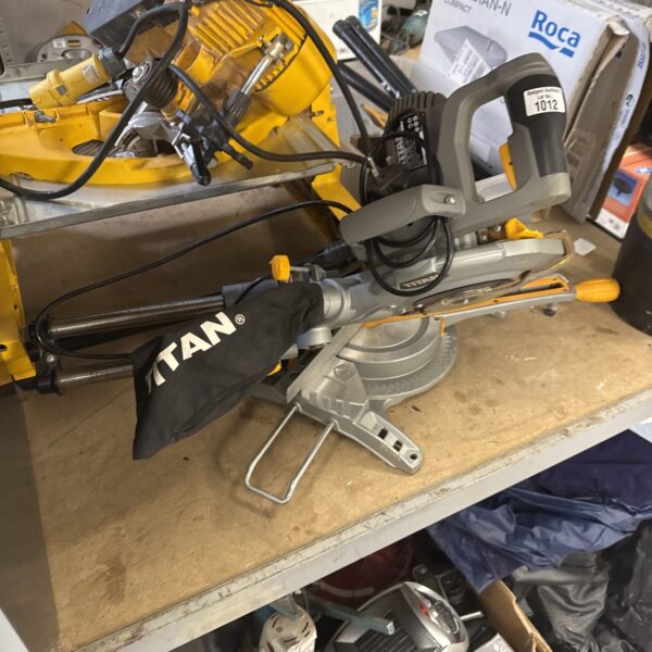 Used Titan mitre saw for woodworking and DIY projects.
