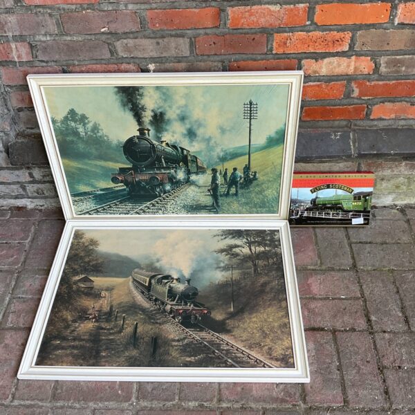 Vintage GWR steam train print in a scenic landscape.