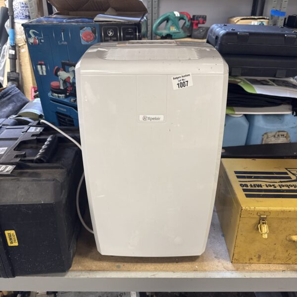 White Xpelair dehumidifier, vintage home appliance for moisture removal.