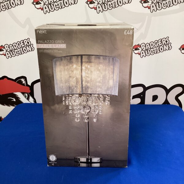 Next palazzo grey table lamp with crystal shade for home decor.