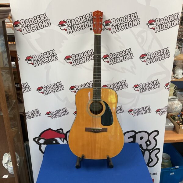 Fender acoustic guitar with serial number 98091231, side view.