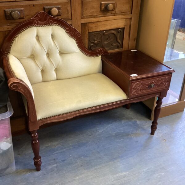 Vintage dark wood telephone table with lift-top and seat.