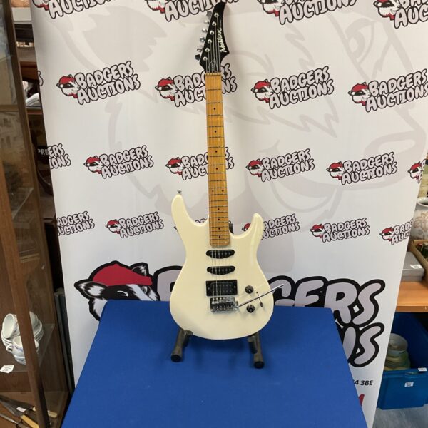 Washburn KC-LTD electric guitar with a vibrant finish.