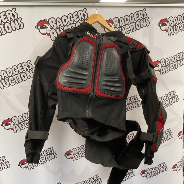 Black and red Gear X motorcycle protective jacket with armour padding.