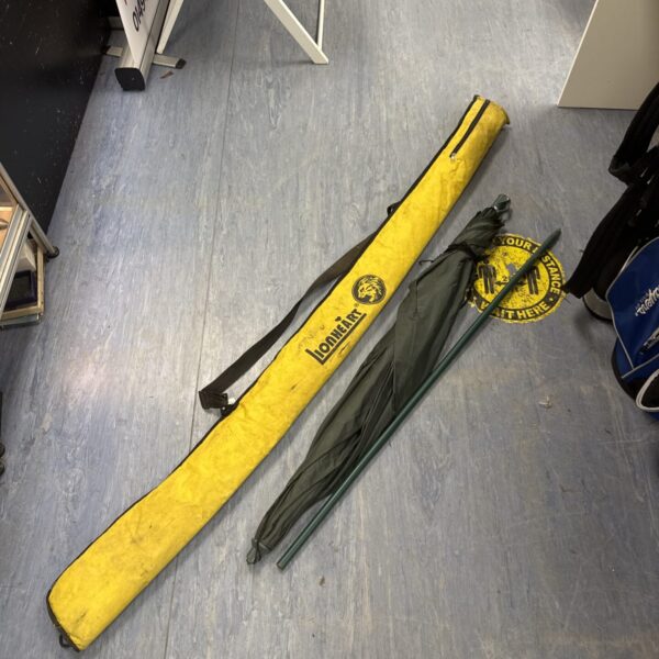 Yellow fishing umbrella case with drawstring closure.