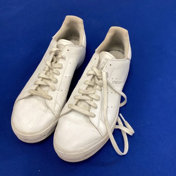 White Adidas Stan Smith trainers size 11, classic retro style.