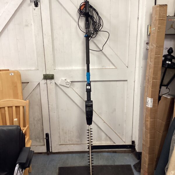 Used MacAllister pole trimmer for garden hedge maintenance.
