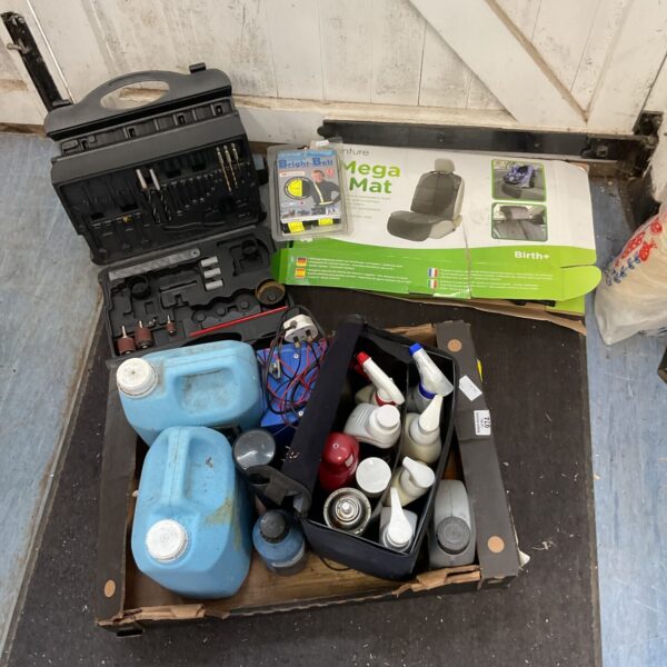 Mixed garage clearance lot with tools and valet kit.