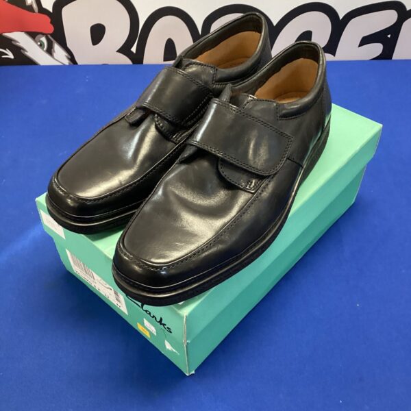 New black leather Clarks size 12 shoes for men.