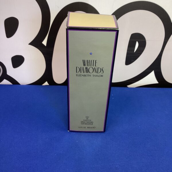 Vintage Elizabeth Taylor White Diamonds perfume bottle, classic fragrance.
