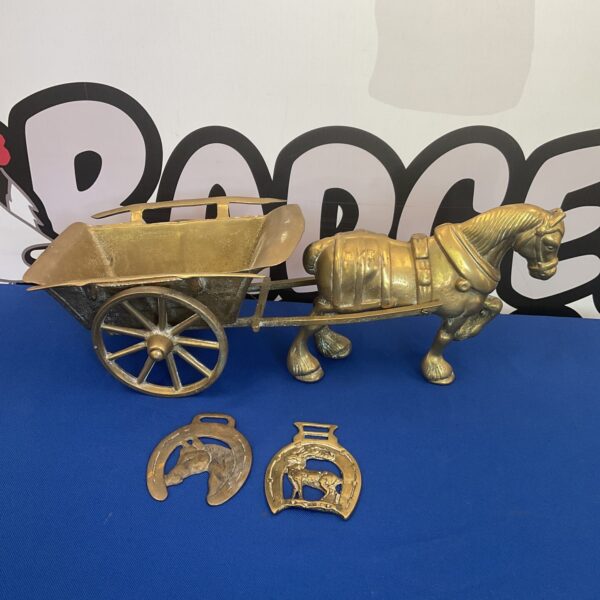 Antique brass shire horse and cart figurine with horse brasses.