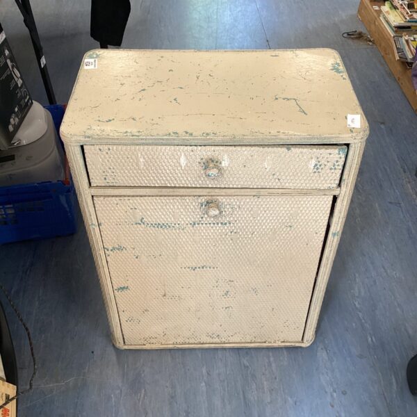 Vintage Lloyd Loom cabinet with woven paper rush, offering retro storage.
