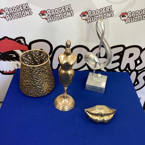Gold modern art table decorations set for elegant display.