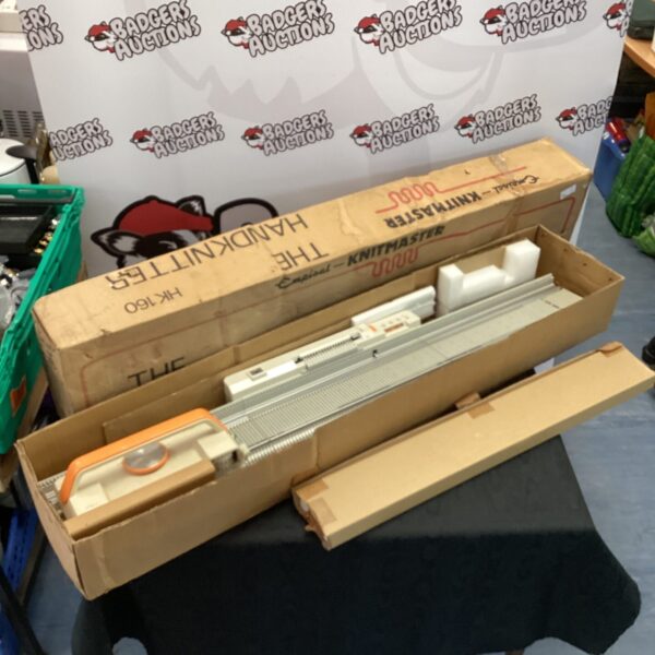 Vintage Empisal Knitmaster HK160 knitting machine in original box.