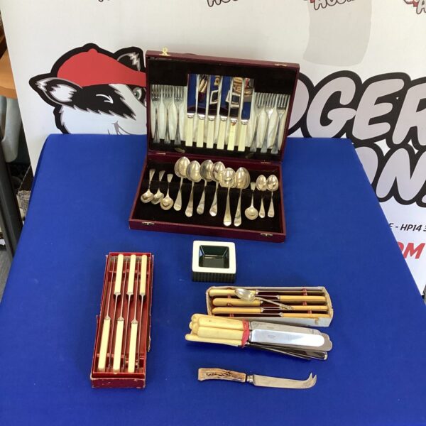 Vintage bone handle cutlery set with silver plated blades.