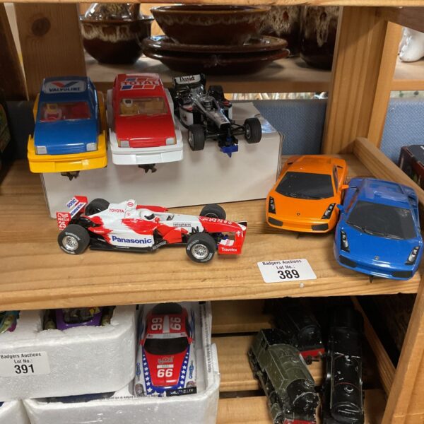 Selection of vintage Scalextric cars for collectors and racing enthusiasts.