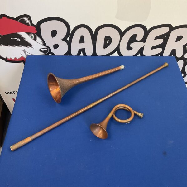 Vintage copper coaching horn, antique musical instrument for signalling.