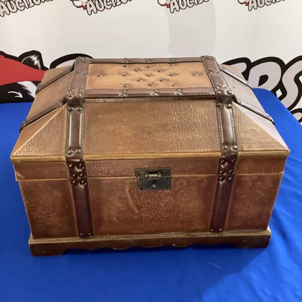 Antique leather storage box with velvet lining, a collectible item.