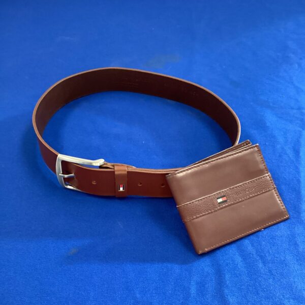Brown leather Tommy Hilfiger belt and wallet set displayed.