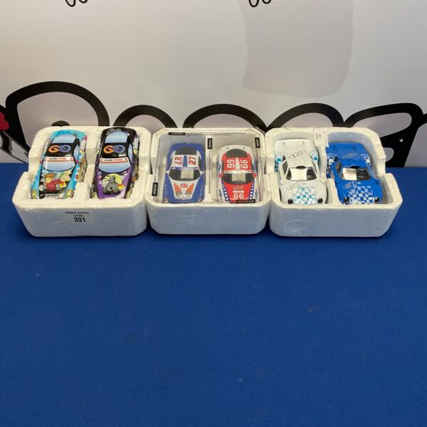 Six scalextric track cars