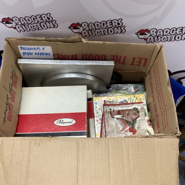 Box of vintage table linens including placemats and napkins.