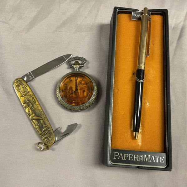 Vintage pocket watch set with pen and fisherman’s knife.