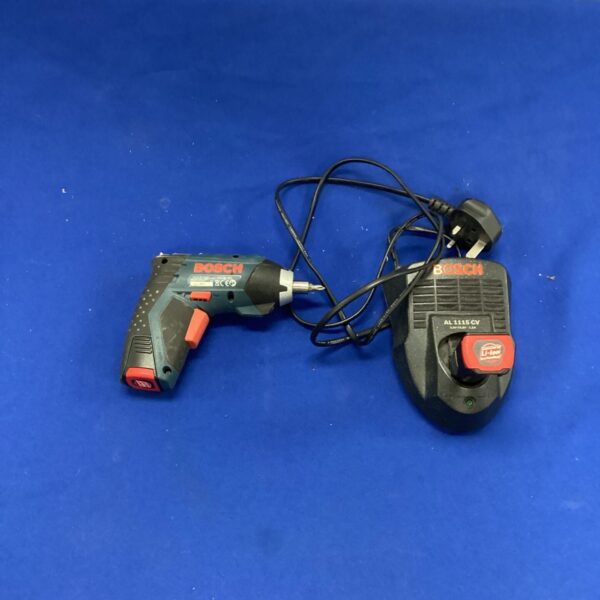 Used Bosch cordless drill with battery, ideal for DIY projects.