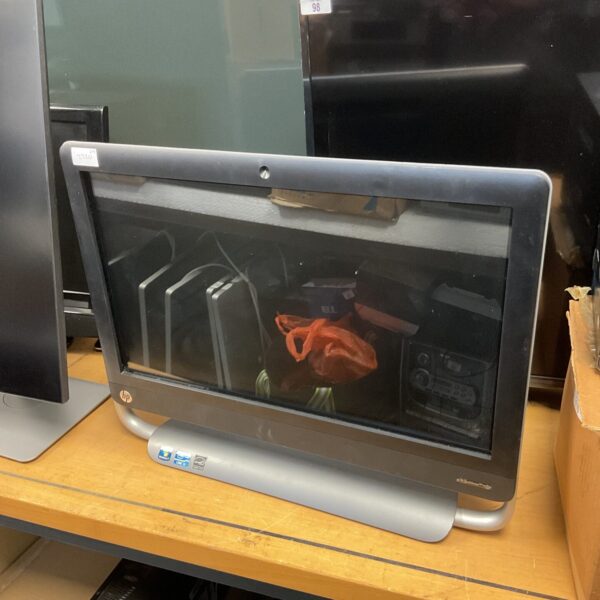 HP TouchSmart all-in-one computer with touchscreen display.