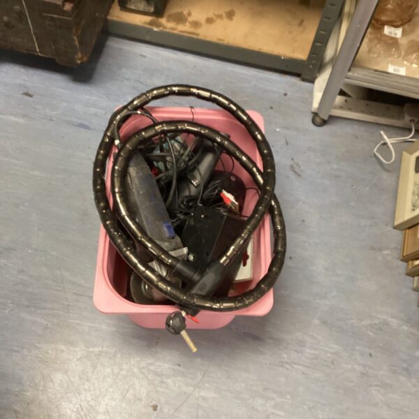 Motorbike security lock within a mixed lot of items.