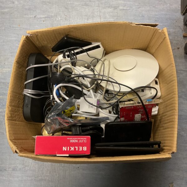 Networking equipment lot with Belkin mesh wifi and cables.