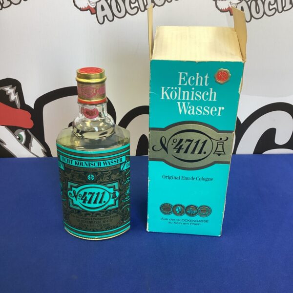 Vintage bottle of Echt Kölnisch Wasser 4711 cologne, classic German fragrance.