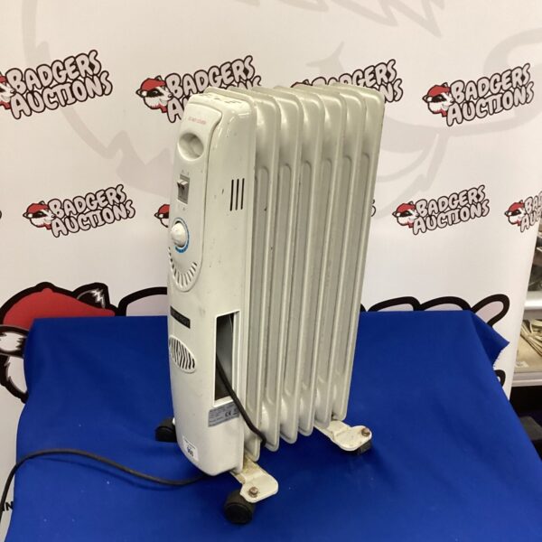 White portable radiator heater for home use.