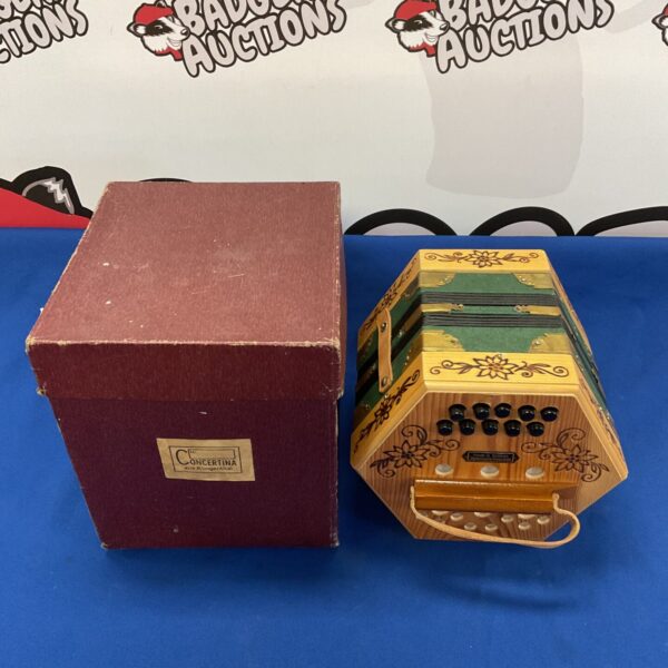Vintage GDR concertina with mother-of-pearl inlay and button keys.