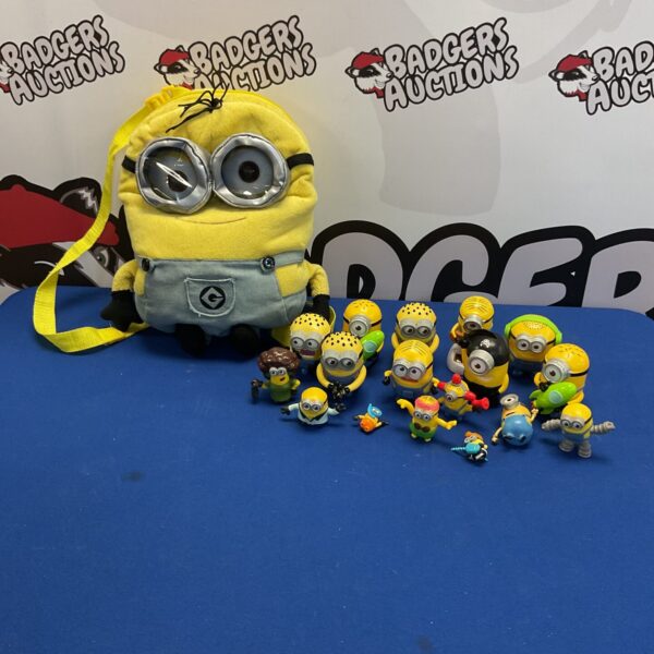 A colourful collection of Minion toys including a backpack and McDonald's figures.