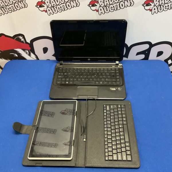 HP ultrabook laptop with portfolio tablet case displayed.