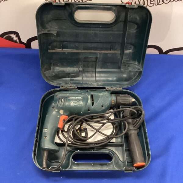 Vintage Black and Decker drill in its original carrying case.