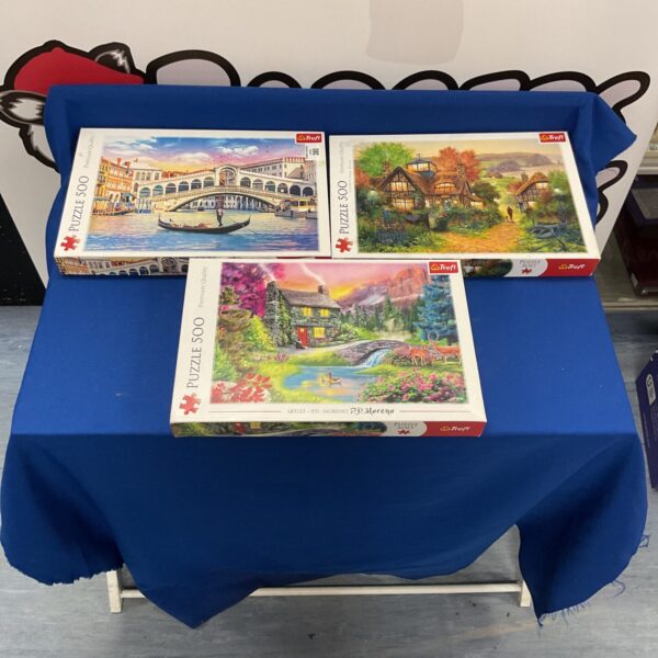 Trefl jigsaw puzzle lot of three 500-piece puzzles.