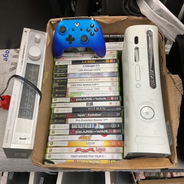 Xbox 360 console and games bundle for retro gaming enthusiasts.